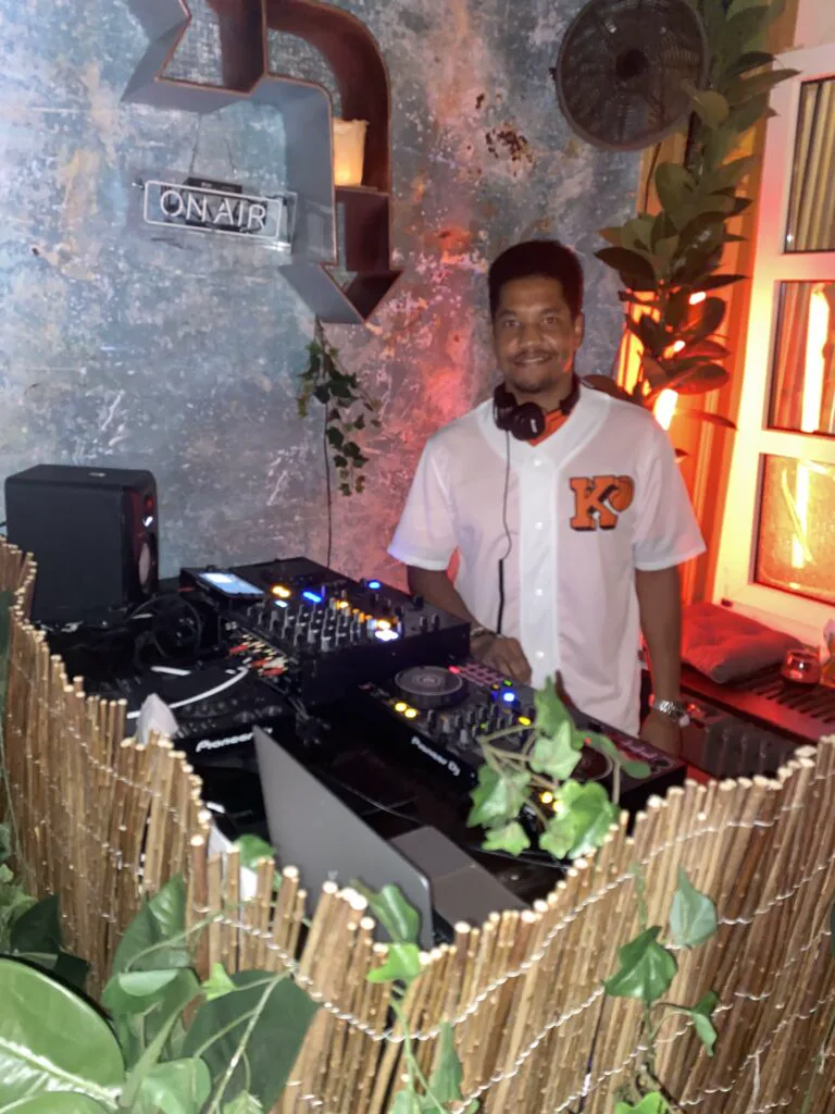 DJ Manoss entertaining a full dancefloor in Switzerland